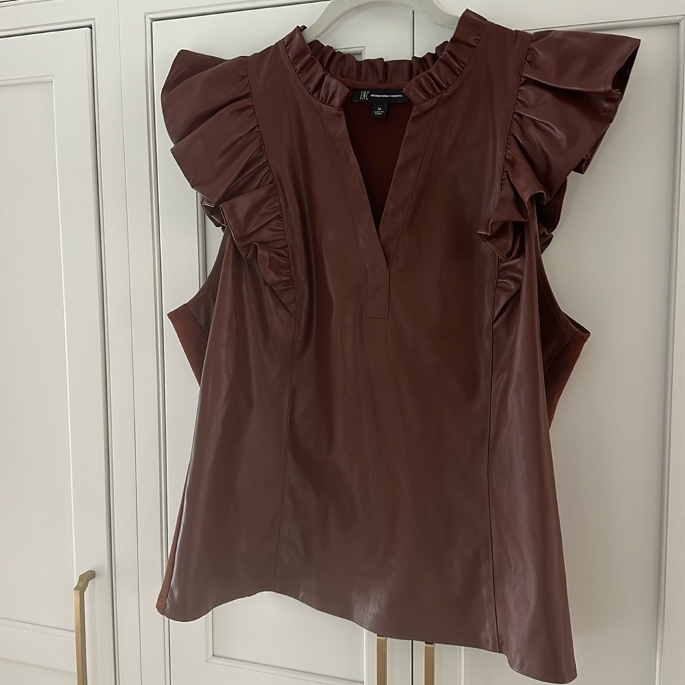 Brown pleather front top with spandex back, ruffle sleeves.